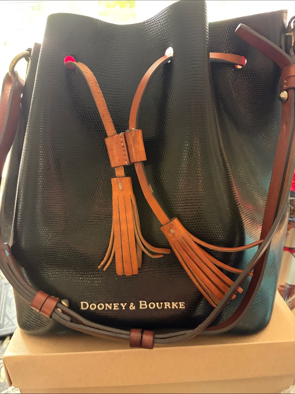 Dooney & Bourke Black Lizard-Embossed Bucket Bag with Brown Tassels